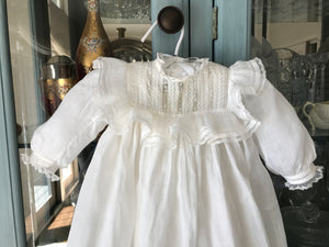 Treated gown over 100 yrs old and stored improperly. We were uncertain if it would withstand a washing but it couldn't be used the way it was.